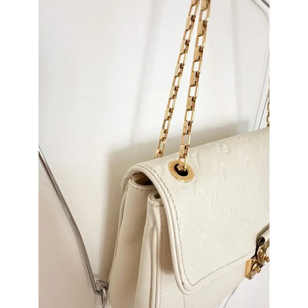 Louis Vuitton Monogram Empreinte Saint Germain PM Chain Flap Bag Dune Cream
